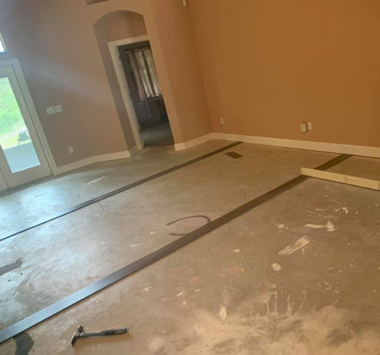Subfloor is being prepared for a new floor to come in place of the old flooring.