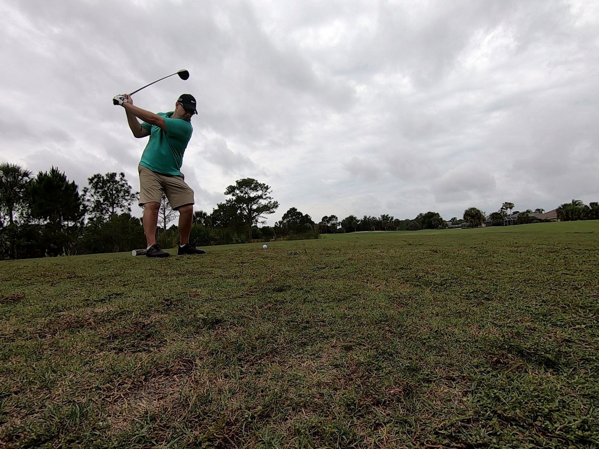 A Man Swinging a Golf Club — North Port, FL — Team Doogie