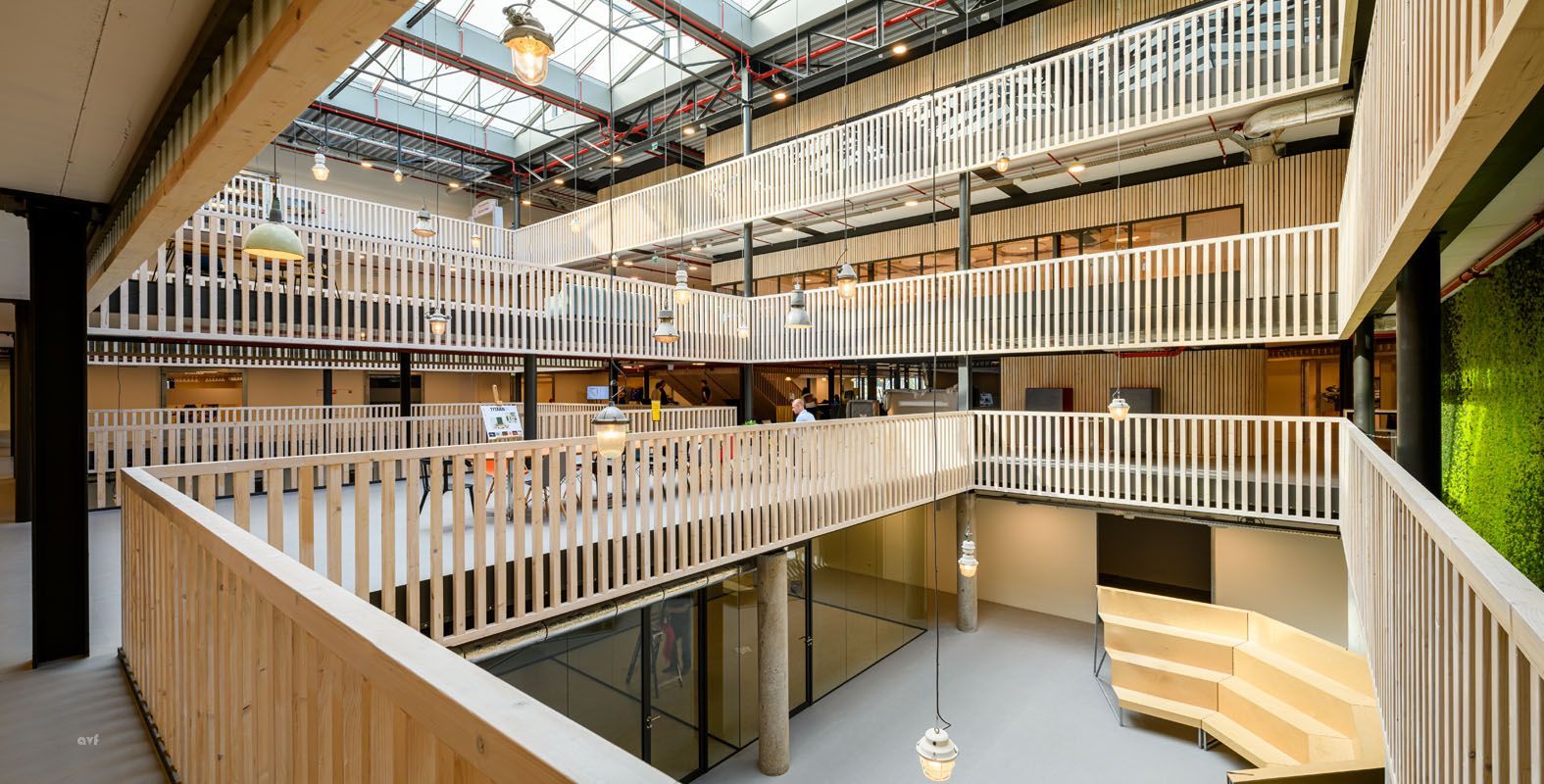 A large building with a lot of balconies and stairs.