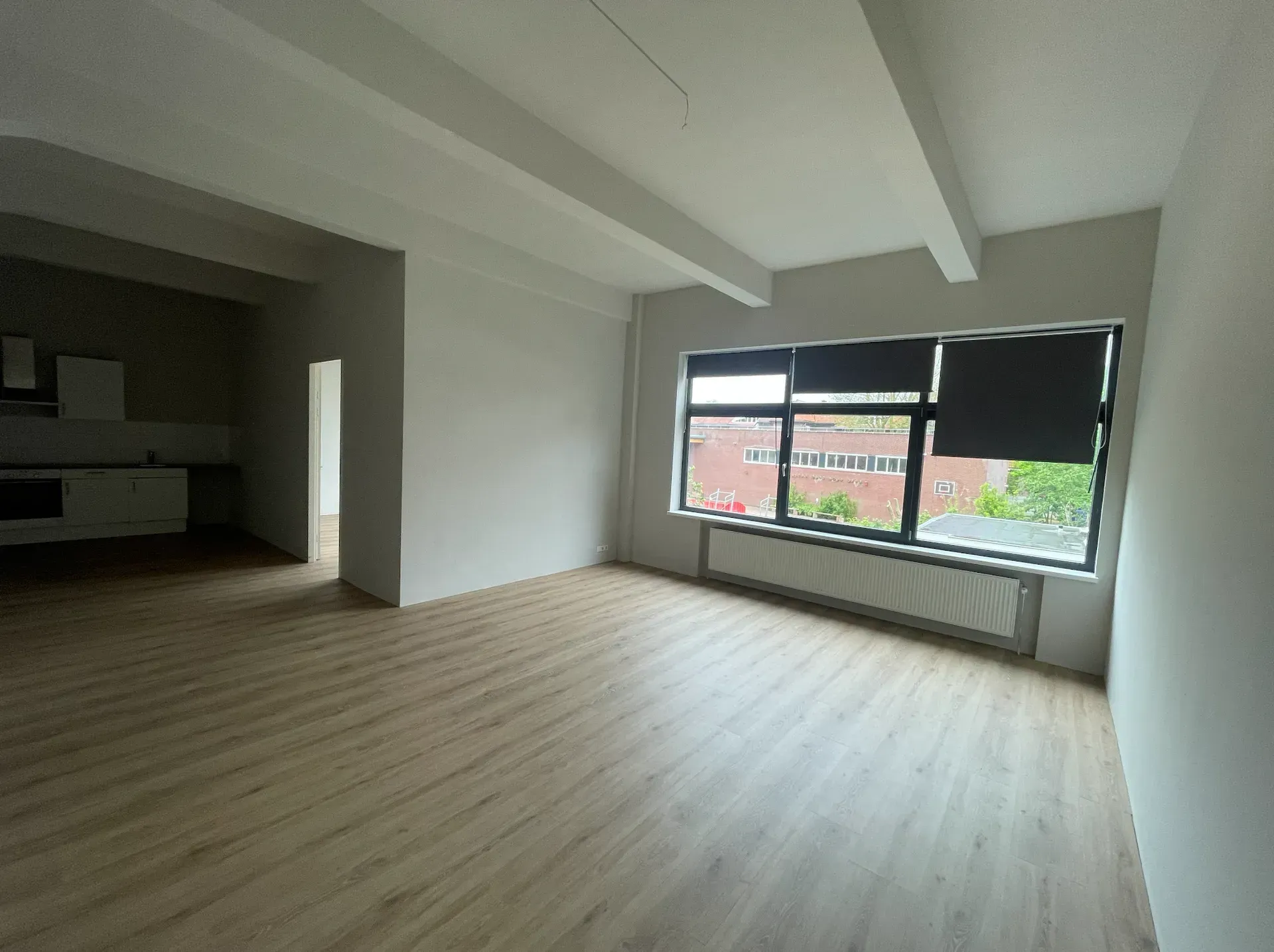 There is a large window in the middle of the room.