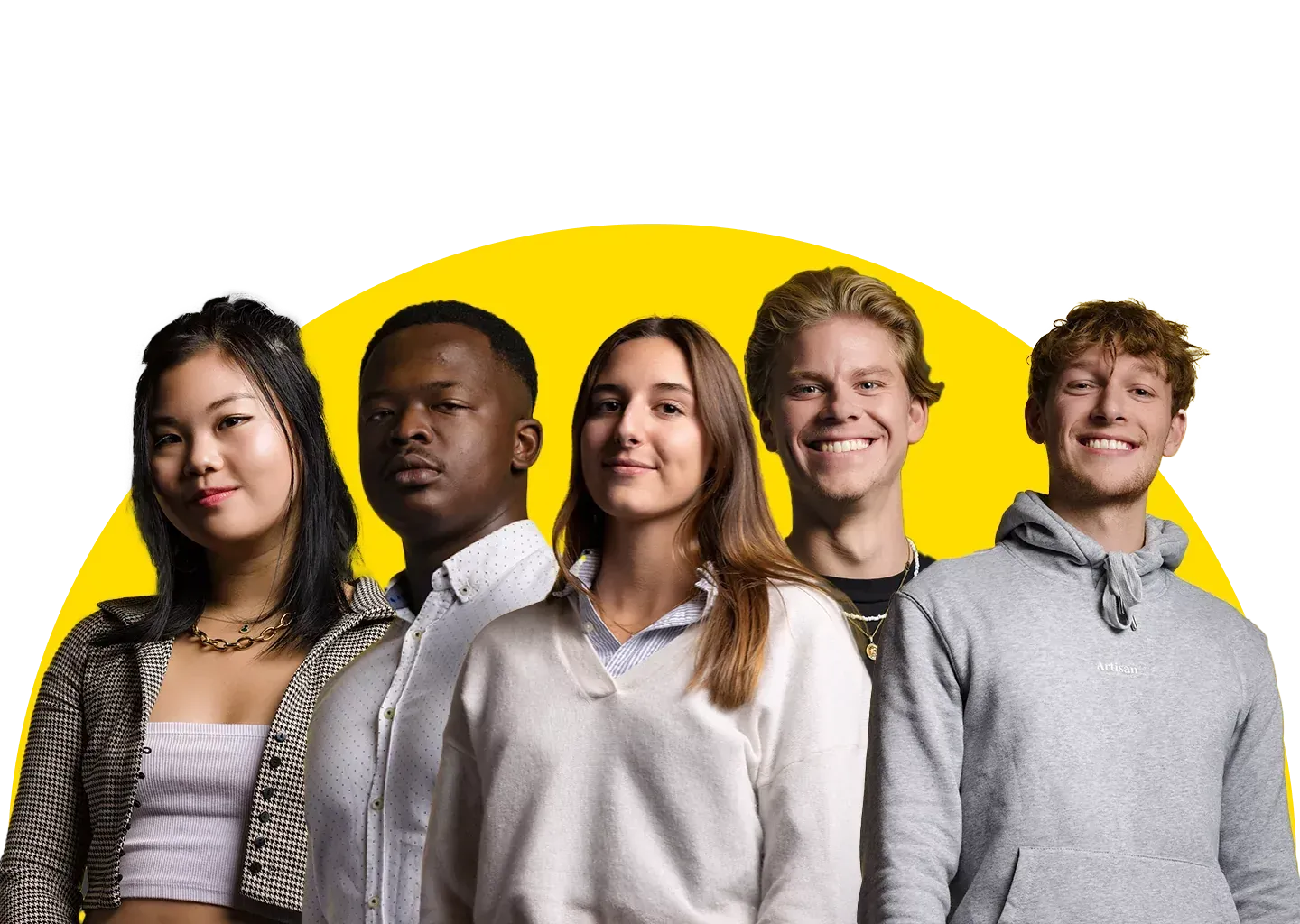 A group of young people are posing for a picture in front of a yellow circle.