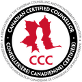 Logo for Canadian Certified Counsellor (CCC). A red maple leaf with human profiles inside, set in a circular black border.