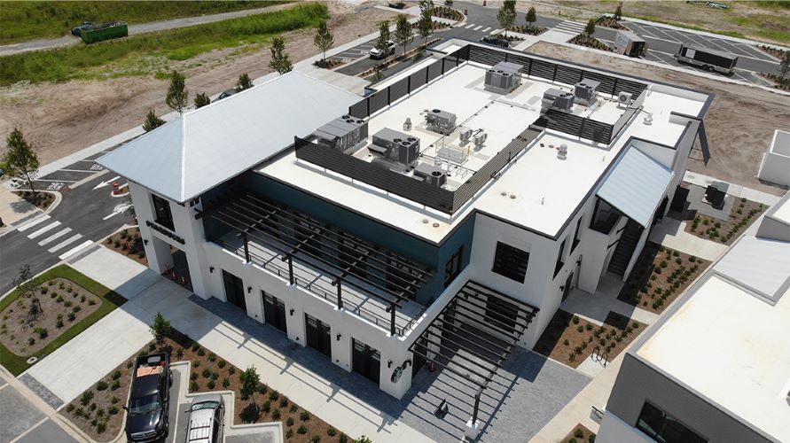 An aerial view of a large building with a lot of windows