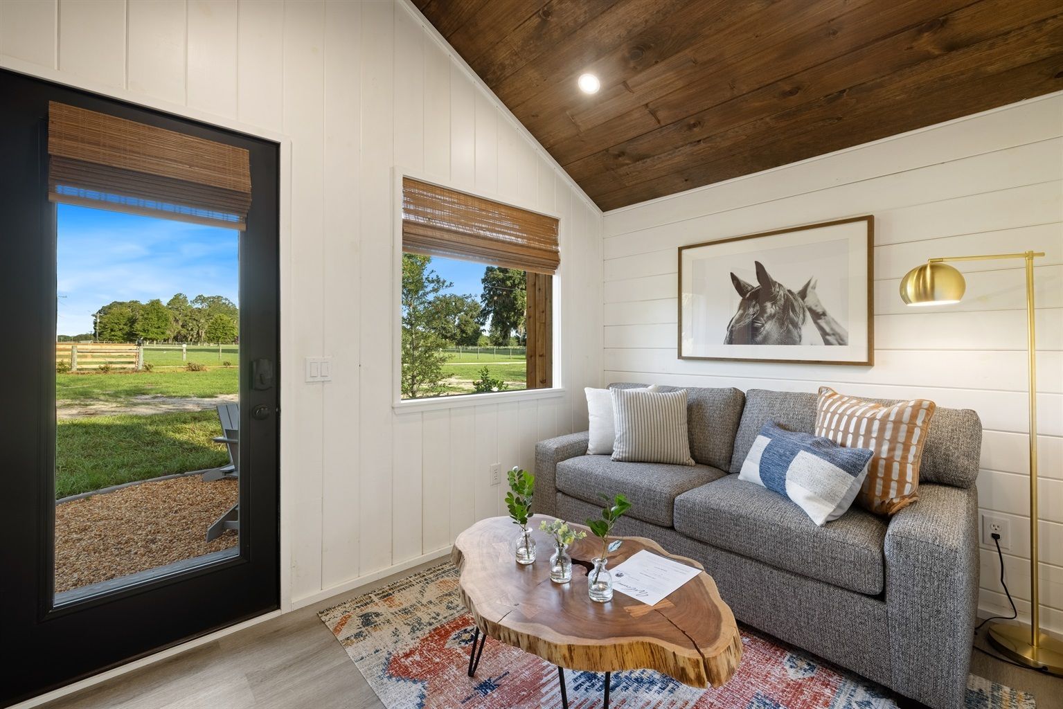 A sunset over a mountain range with a lot of fog