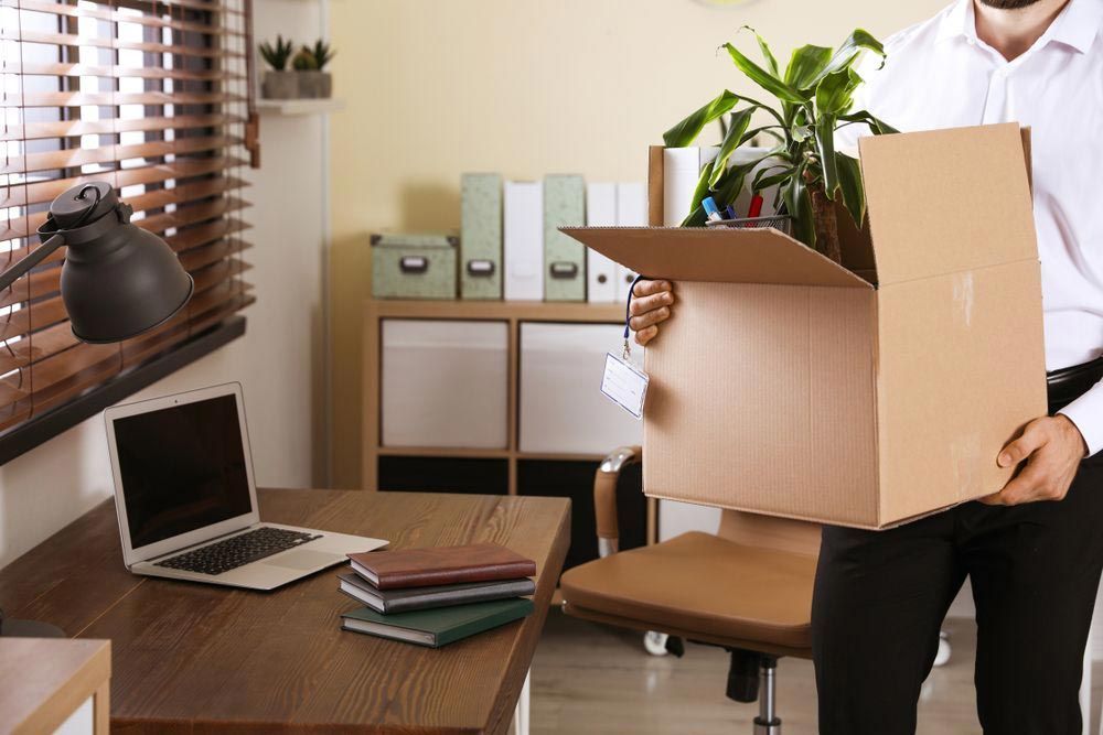 Man Holding A Box For Office Relocation