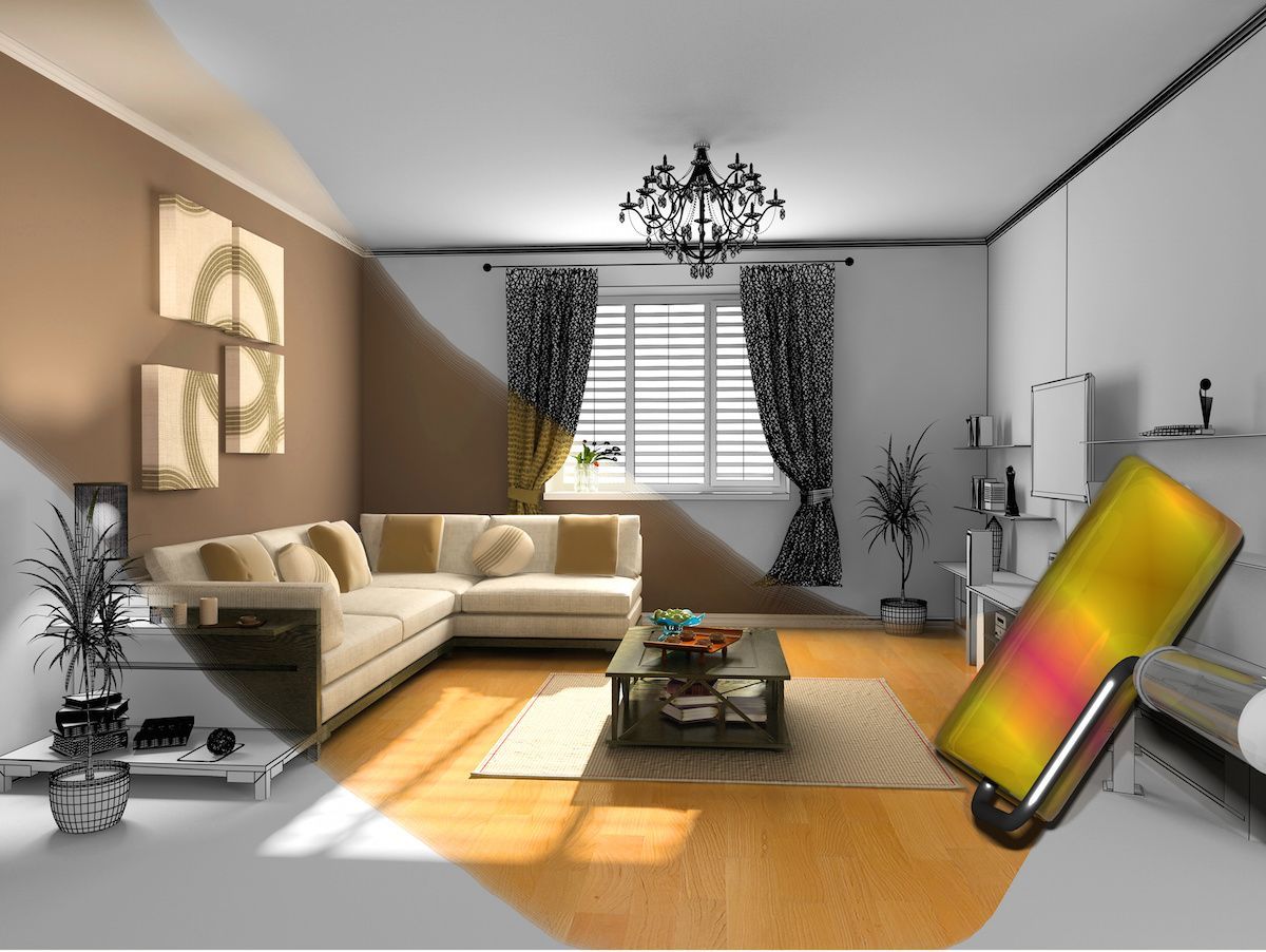 Living room with brown and neutral walls, cream-colored sectional, coffee table, and wood floor. Black and white curtains.