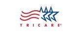 TRICARE logo with three red horizontal waves on the left and three blue outlined stars on the right.