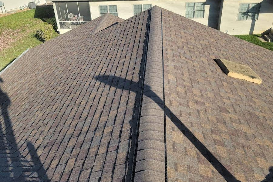 Professional roofers performing repair work