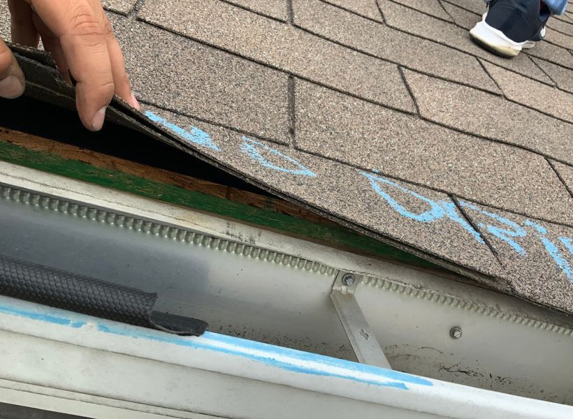 damage underneath the shingles
