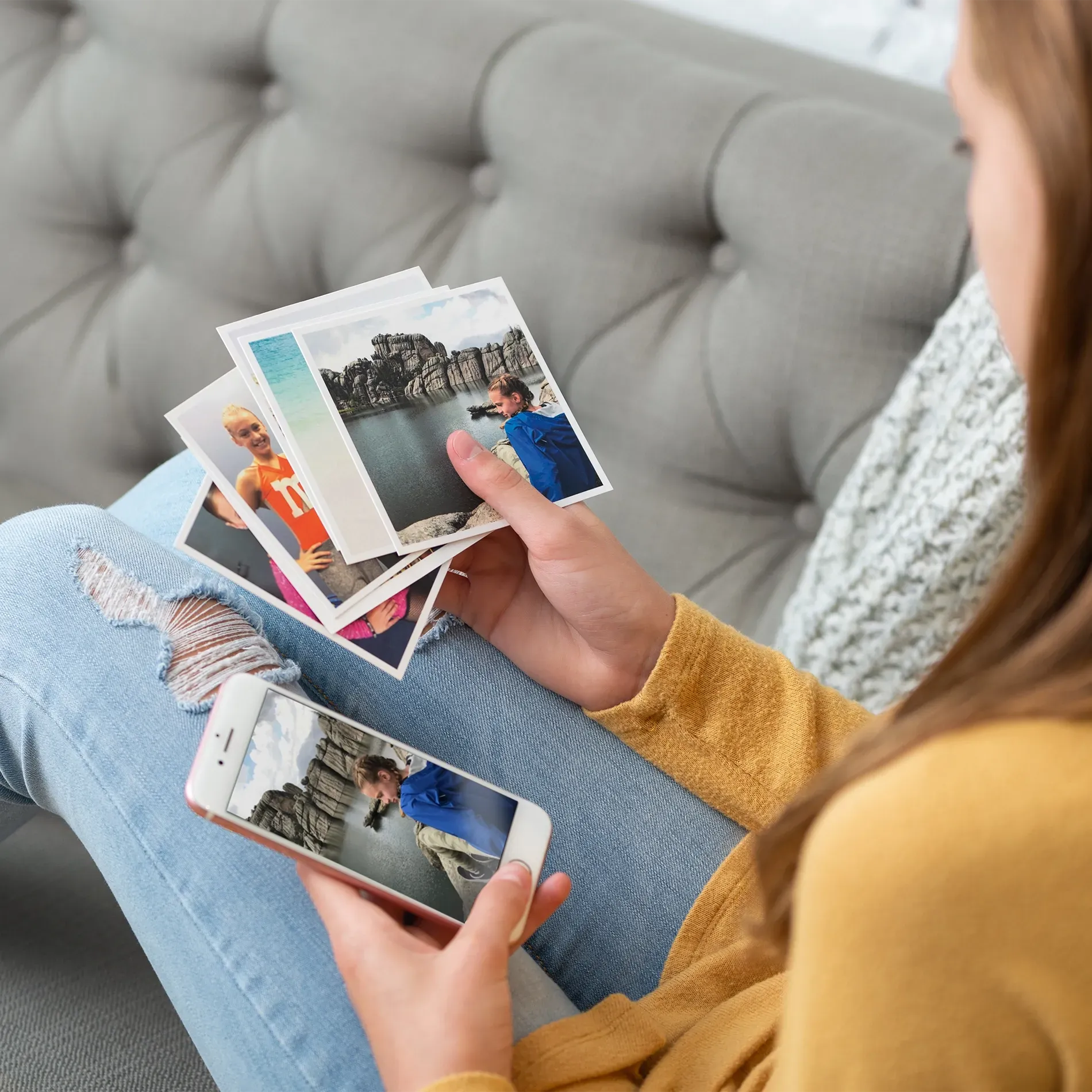 Girl looking at photos from her phone