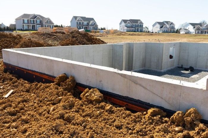 Concrete foundation for a house under construction.