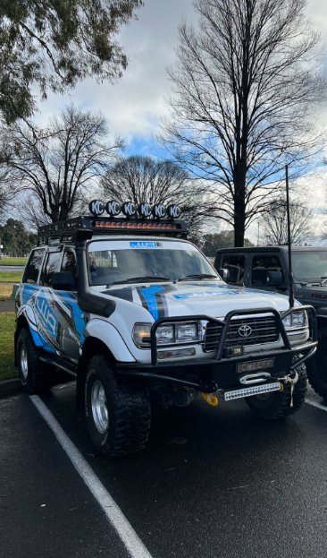 A White Toyota Land Cruiser is Parked in a Parking Lot — Jim Wall Automotive in Mittagong, NSW