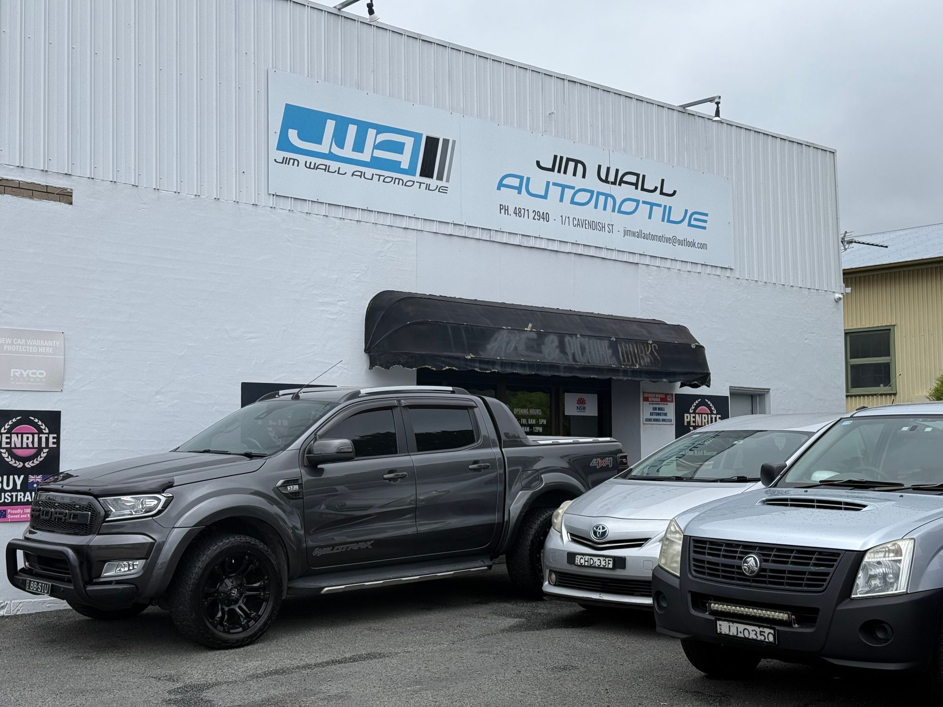 Cars parked in front of a mechanic workshop β Jim Wall Automotive in Mittagong, NSW