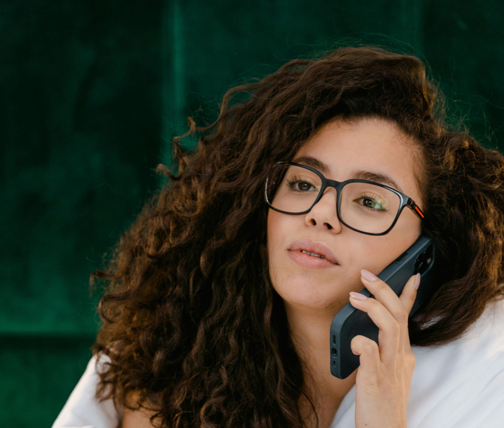 Smartphone on a wooden surface displays