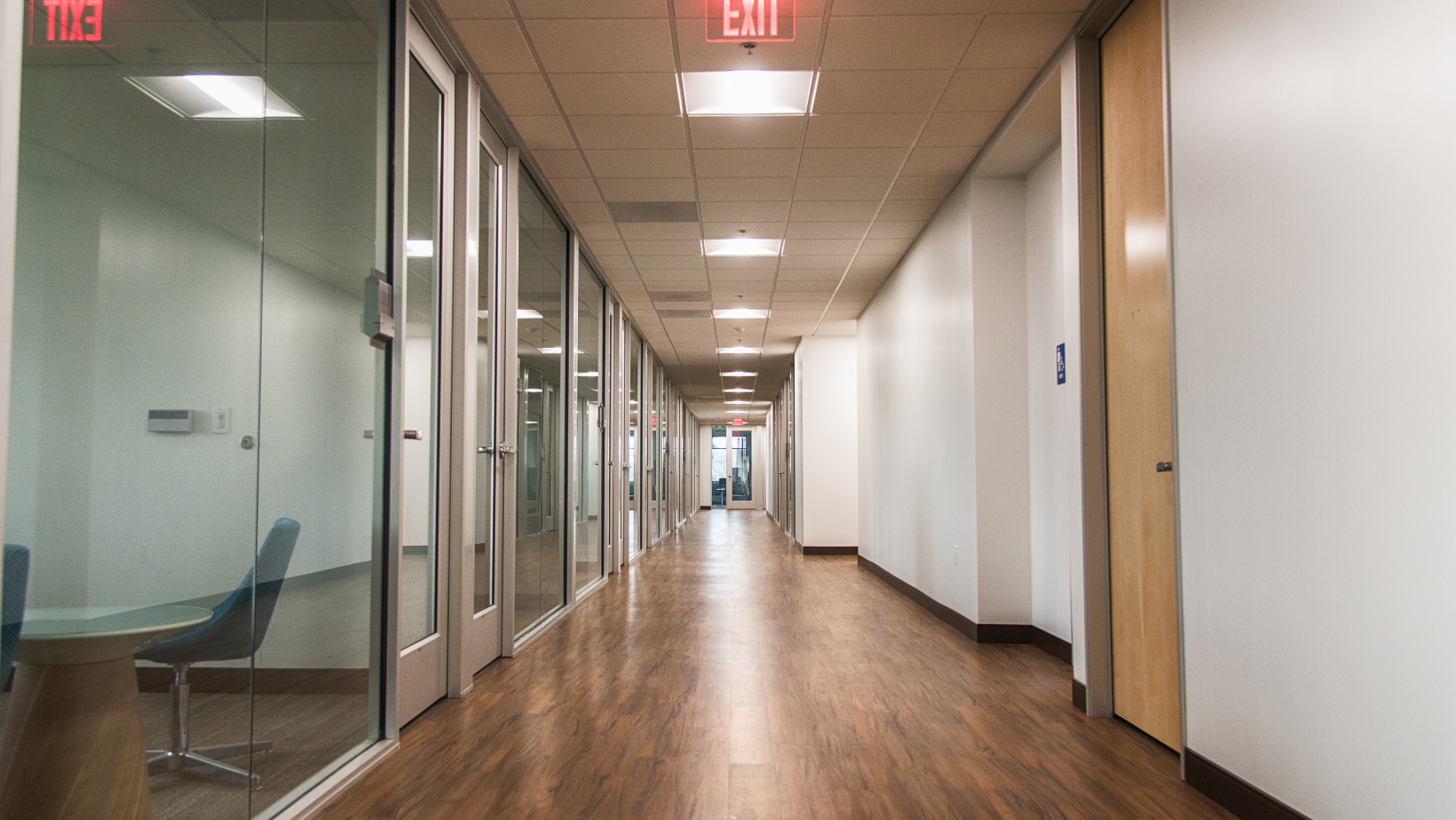 A manhole cover with a hose attached to it.
