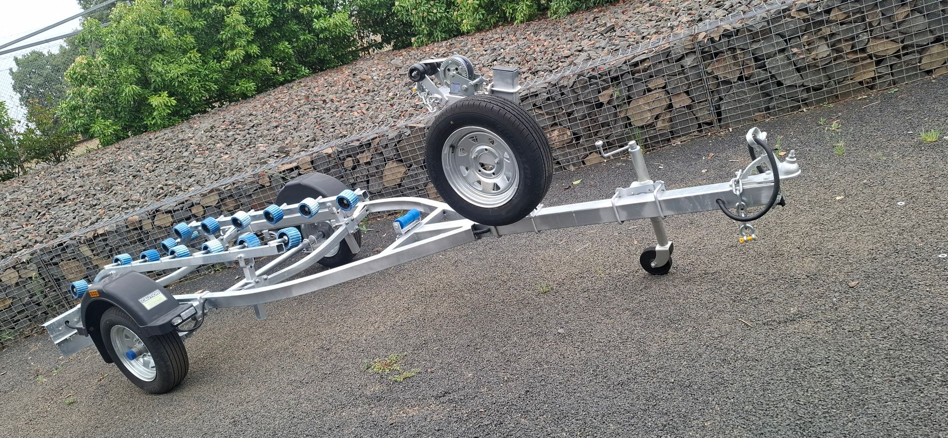 A Boat Trailer Parked on a Gravel Surface — Towform Trailers in Bourke, NSW
