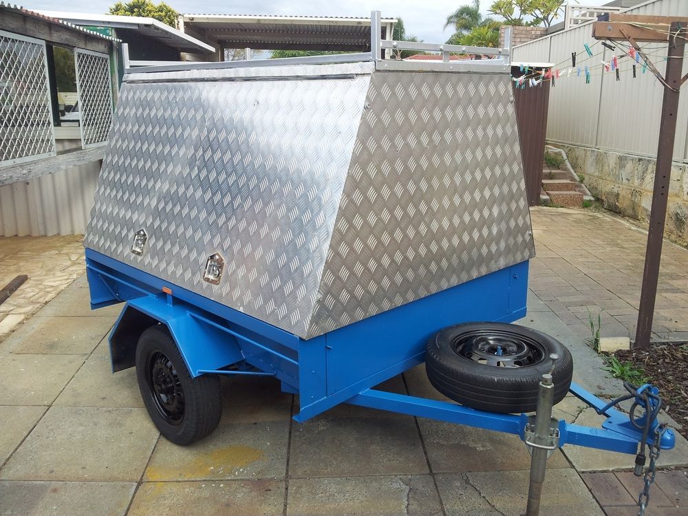 Blue and Silver Utility Trailer With Spare Tire — Towform Trailers in Brocklehurst, NSW