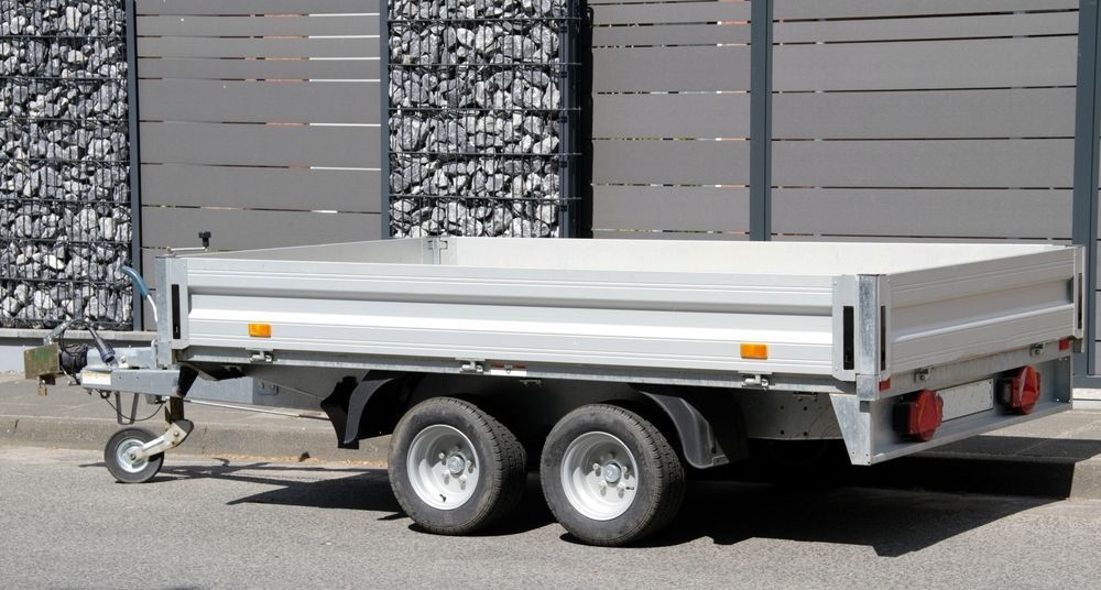 Silver Utility Trailer With Dual Wheels, Parked — Towform Trailers in Brocklehurst, NSW