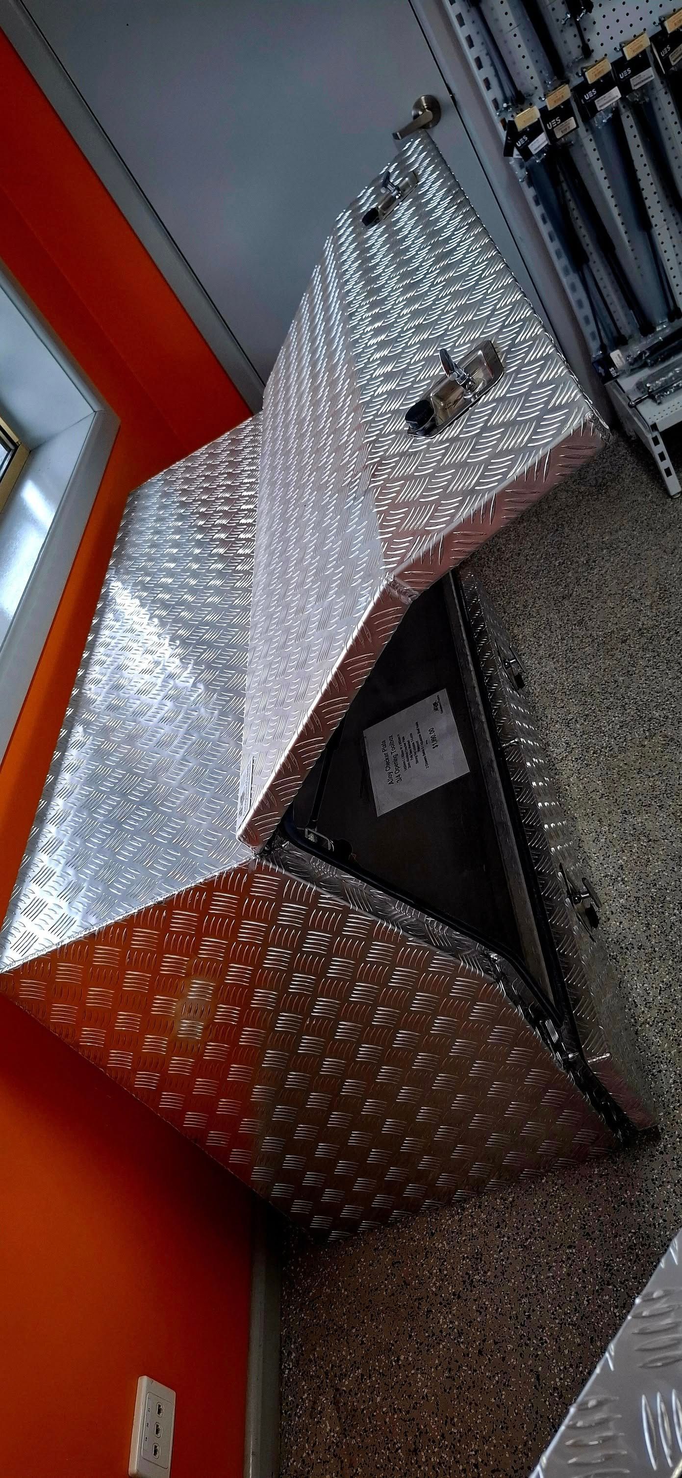 Silver Foil-covered Material With a Bubbling Texture and a Black Interior — Towform Trailers in Brocklehurst, NSW