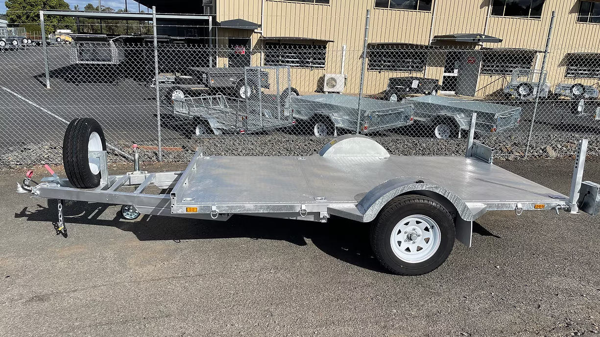 Aluminum Utility Trailer On Asphalt, Spare Tire Mounted — Towform Trailers in Brocklehurst, NSW