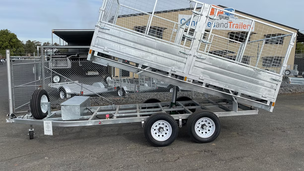 Silver Utility Trailer With Bed Tilted Up — Towform Trailers in Brocklehurst, NSW