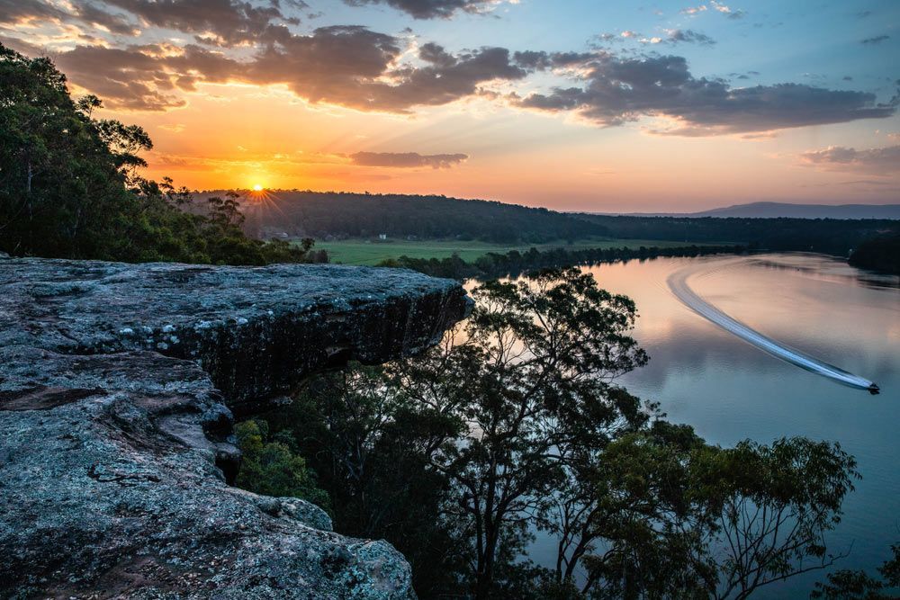 A View of a River From a Cliff at Sunset — A. Webber Building in Nowra, NSW