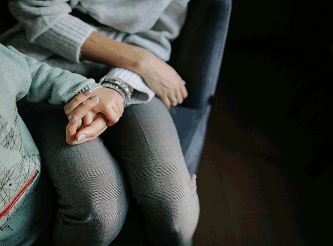 Woman supporting child stronger together