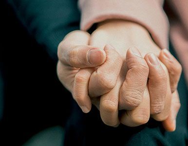 women holding hands