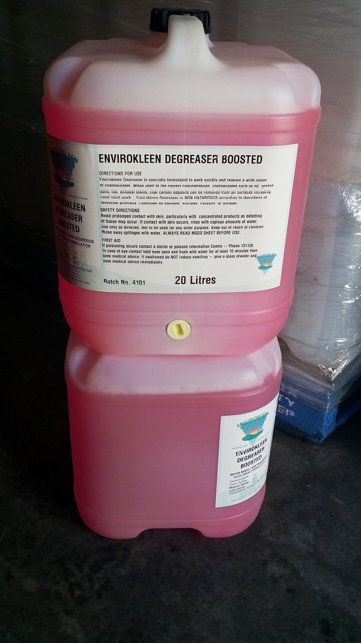 Two Stacked, Pink, Plastic Containers of Liquid Cleaning Solution — Envirokleen Solutions In Slade Point, QLD