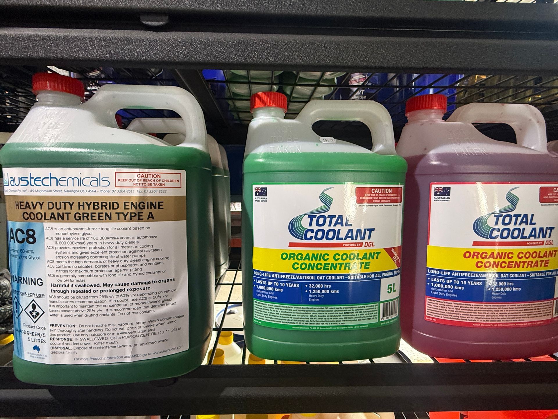 A Person is Cleaning a Sink With a Sponge and Spray Bottle — Envirokleen Solutions In Slade Point, QLD