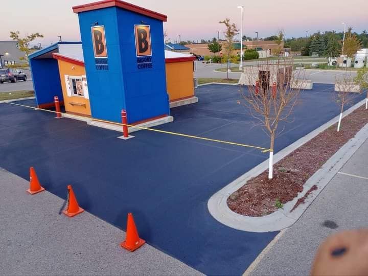 A blue building with the letter b on it.