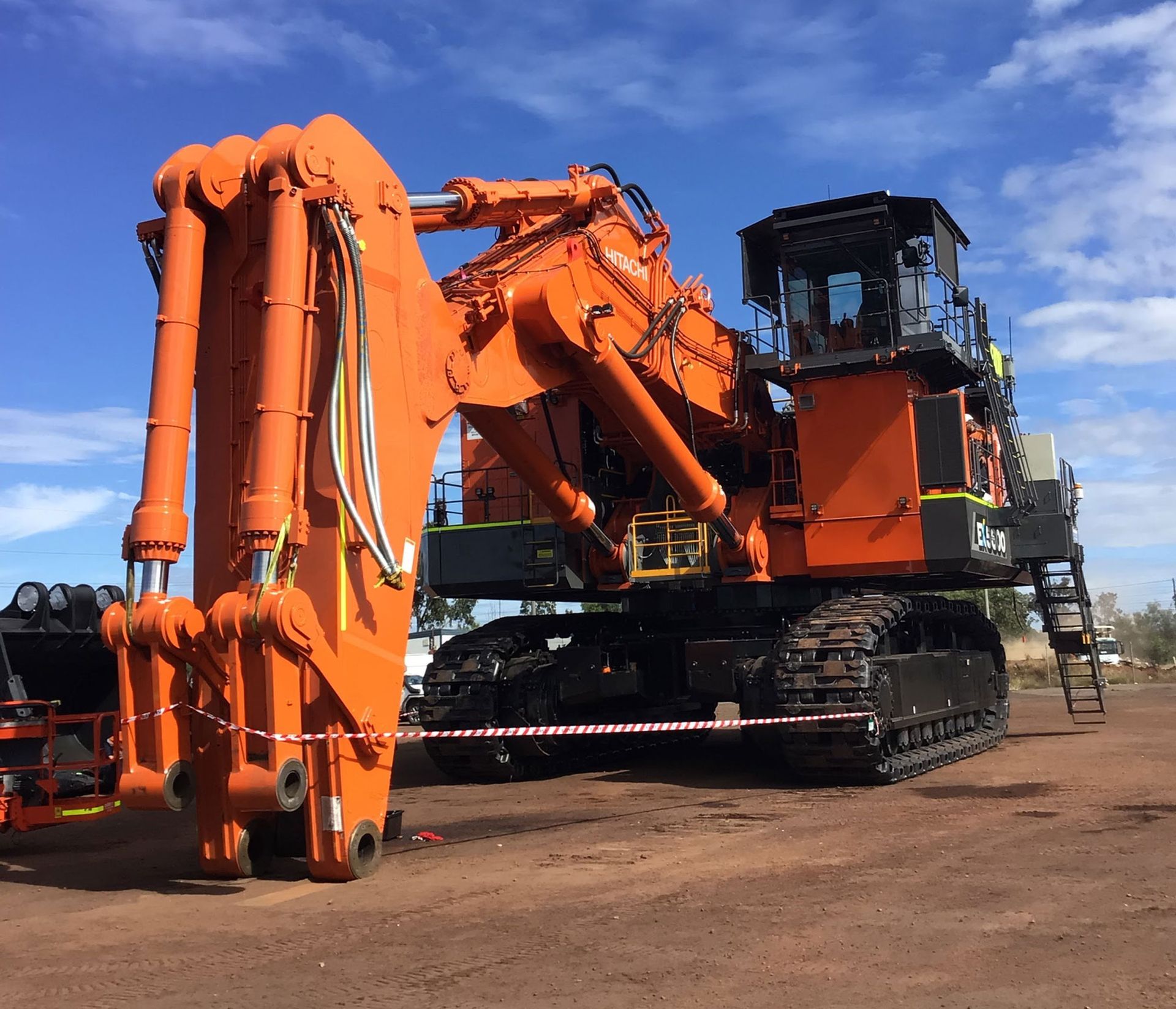 An Orange Hydraulic Excavator For Fleet Compliance