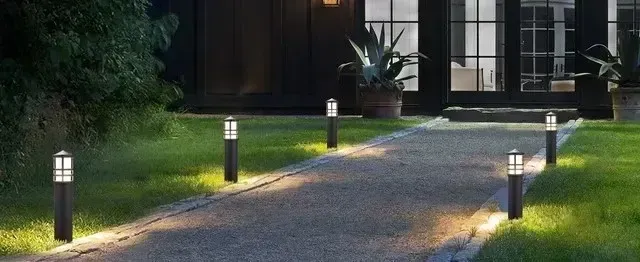 Local Electricians - The evenly spaced bollard lights provide warm illumination, improving visibility at night. These energy-efficient outdoor lighting solutions create an inviting ambiance while ensuring a well-lit pathway for homeowners and guests