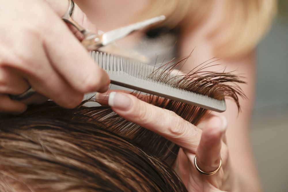 Woman Facing on the Mirror — Hair Salon in Bulli NSW