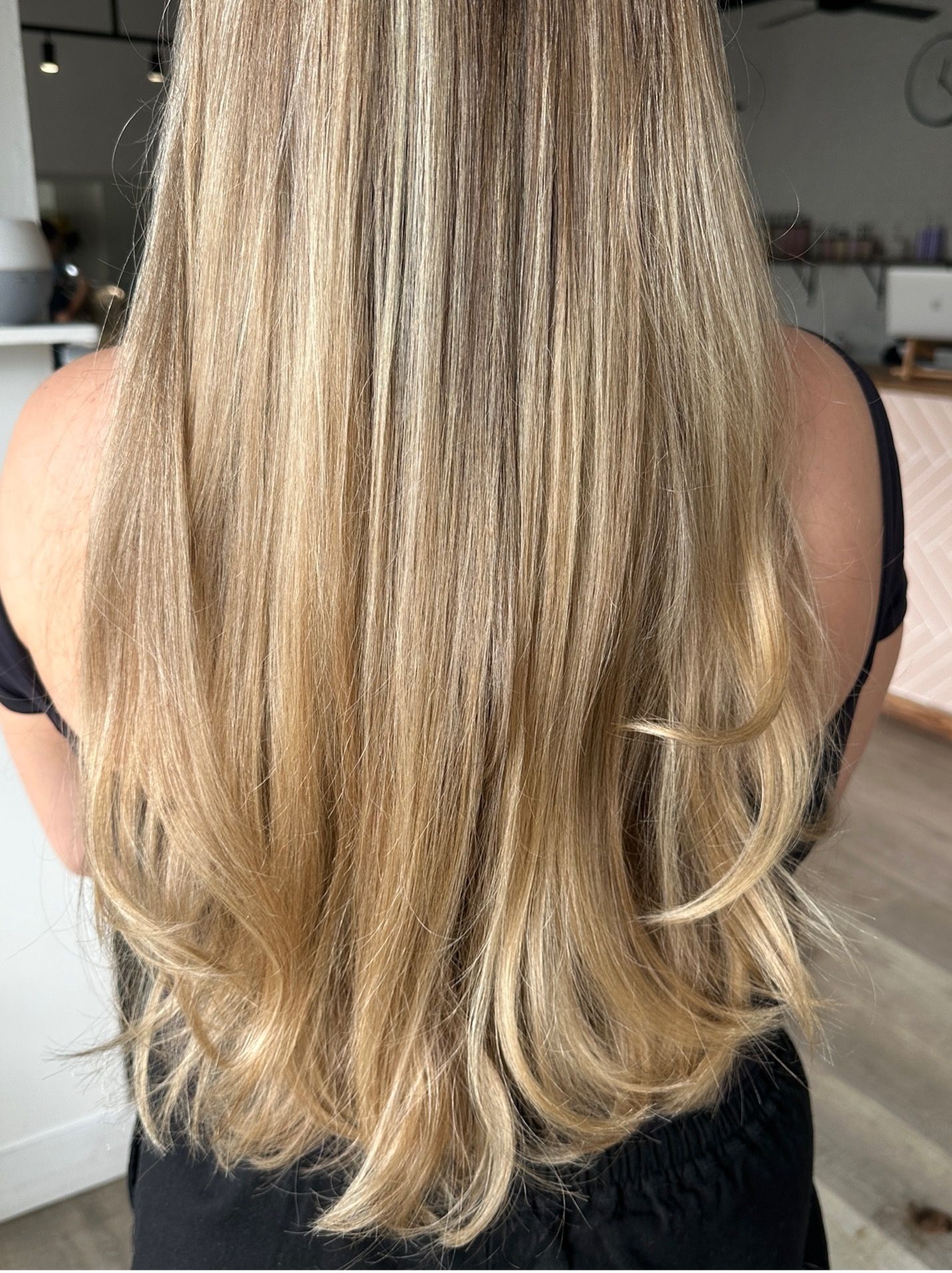 Woman with Long Blonde Hair — Hair Salon in Bulli NSW