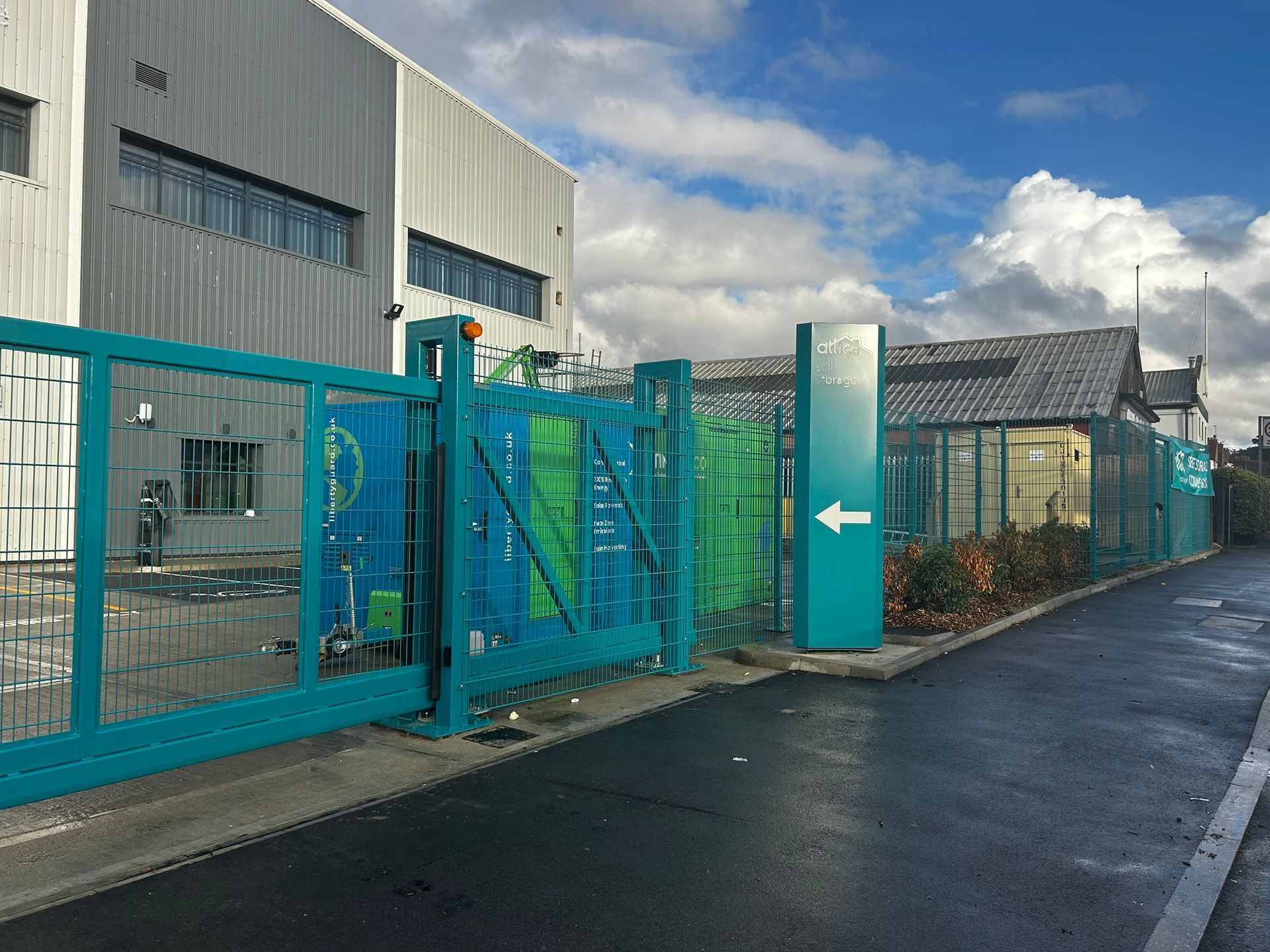 Automated steel security gates with mesh panels – Attic Self Storage London, subcontracted by Crofton Interiors