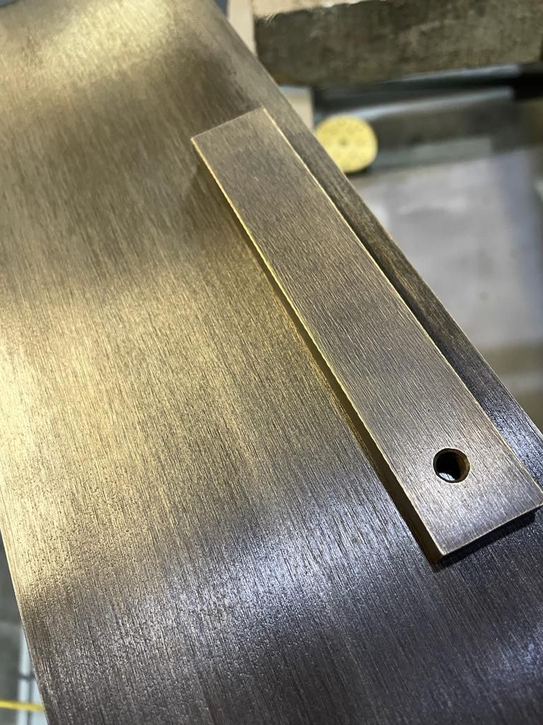 Brushed brass finish detail – custom metalwork by Martinelli Metalworks London
