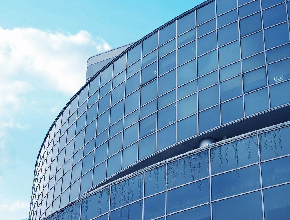 Modern Skyscraper With Tinted Windows — Solarmaster in Murarrie, QLD
