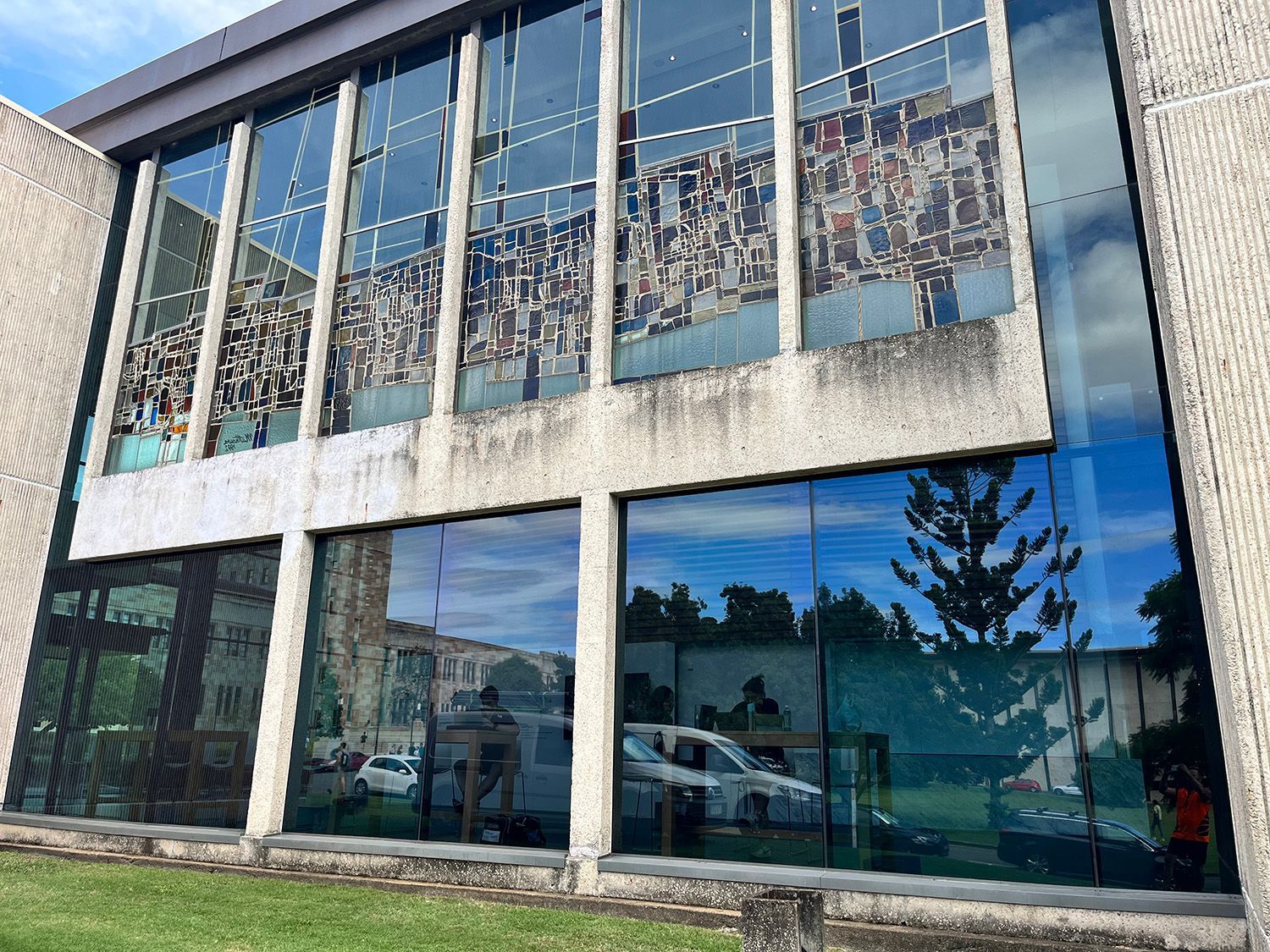 Exterior Of A Building With Large Glass Tinted Windows