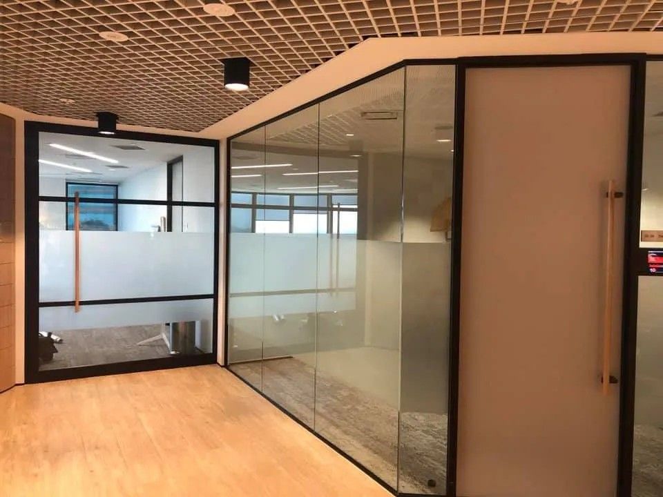 A Hallway with A Lot of Glass Walls and Doors — Solarmaster in Murarrie, QLD