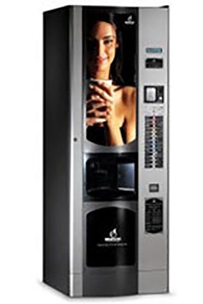 Distributori automatico con l'immagine di una donna con una tazza