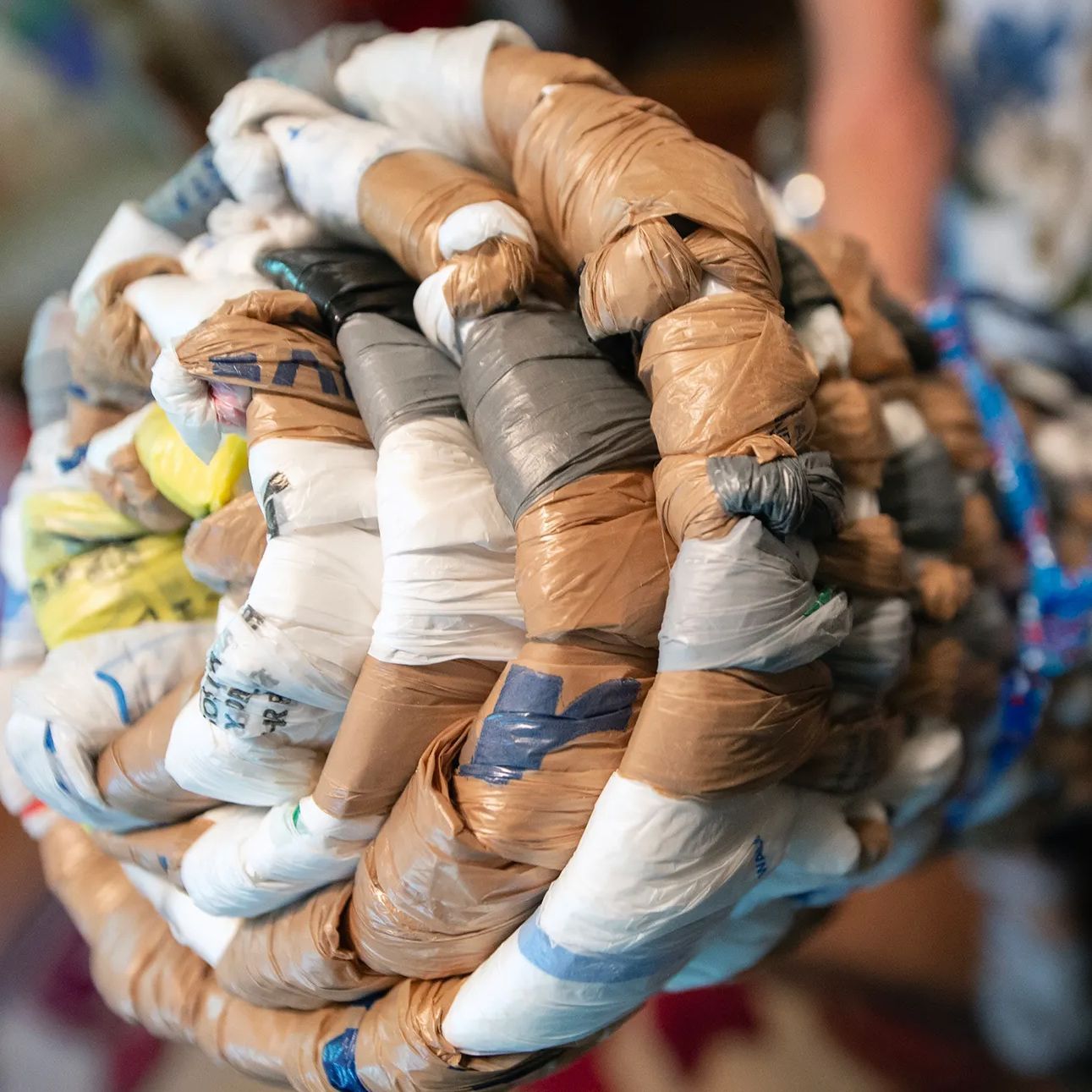 UMCOR logo: stylized cross and flame next to the letters