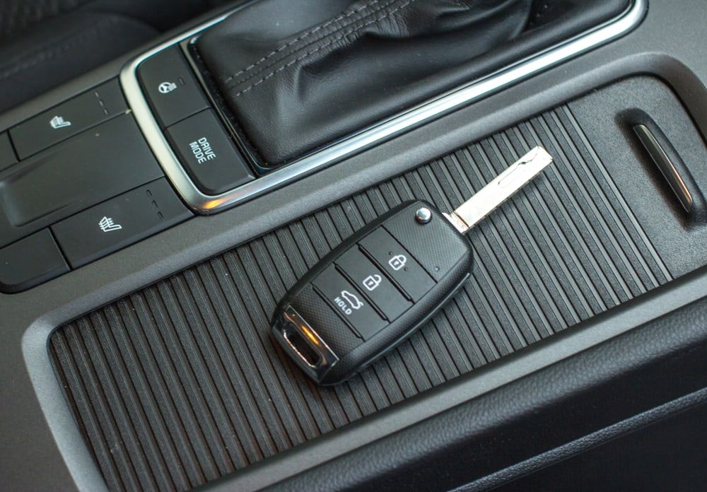 Car Key is Sitting on the Center Console of a Car — Townsville Car Audio Excellence in Townsville, QLD