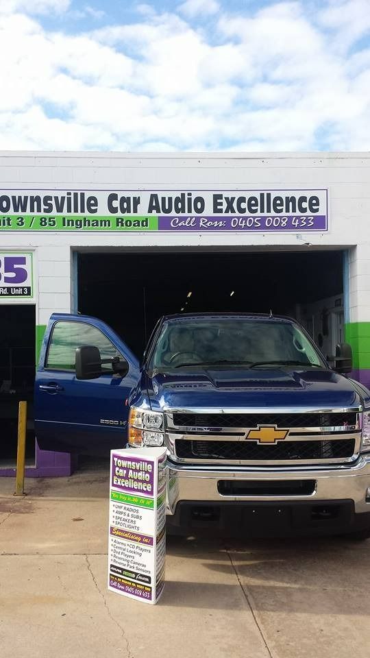 Blue Truck is Parked in Front of a Car Audio Excellence Store — Townsville Car Audio Excellence in Townsville, QLD