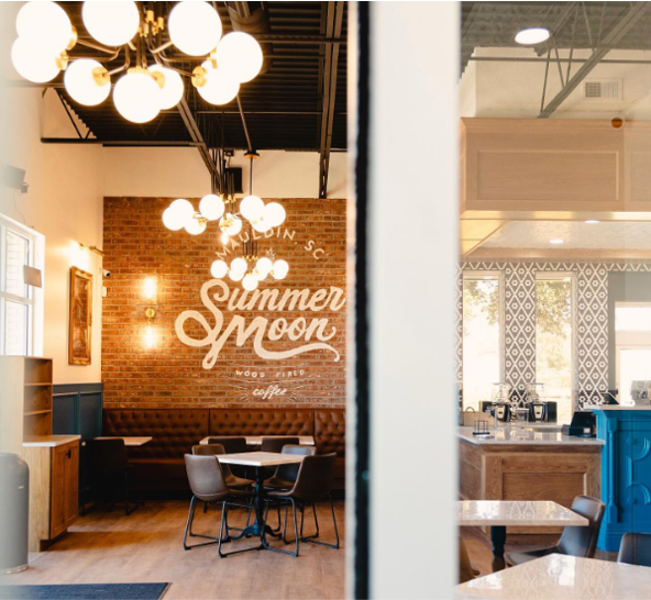 A restaurant with a sign that says summer moon