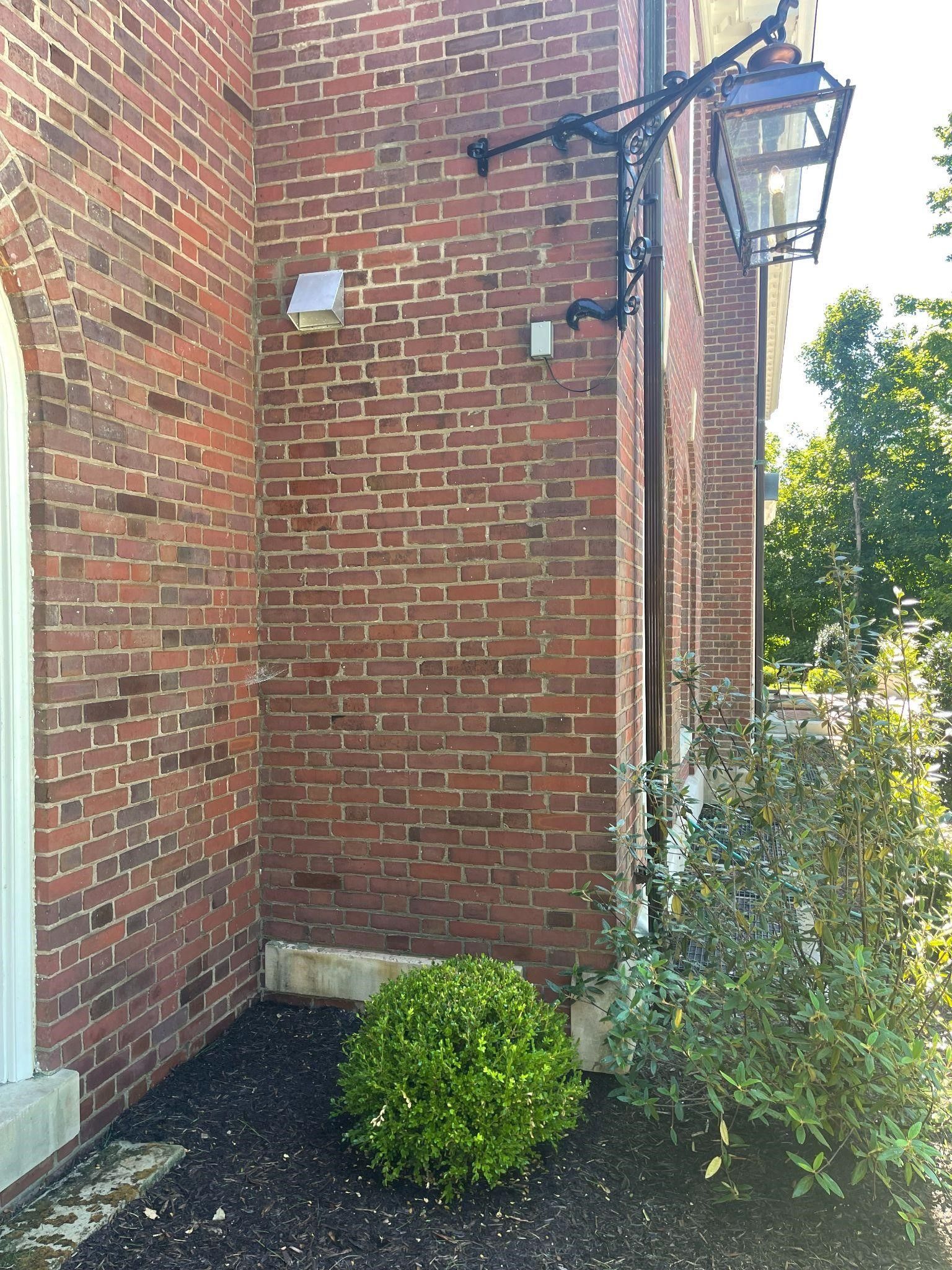 mortar joint repair on brick wall