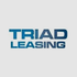 Triad Leasing logo in blue text on a light gray background