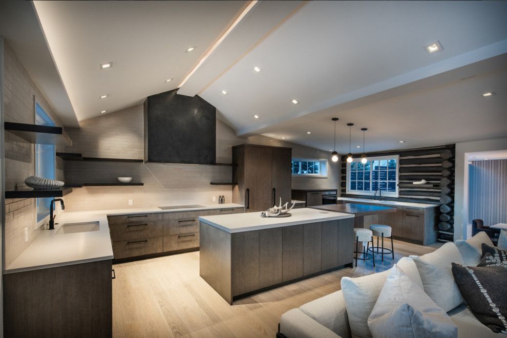 A kitchen with a large island in the middle of it