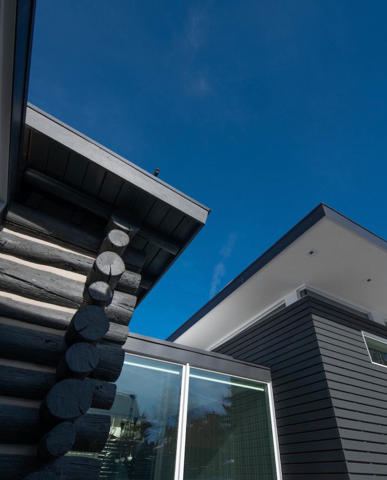 Looking up at a house with a blue sky in the background