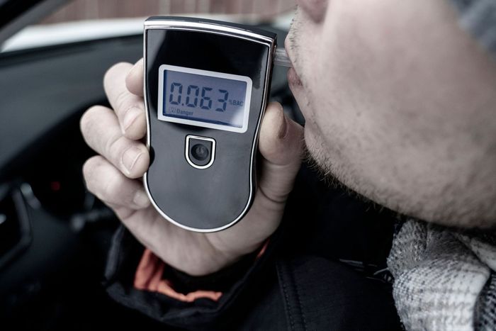 man breathalyzer car testing alcohol drug